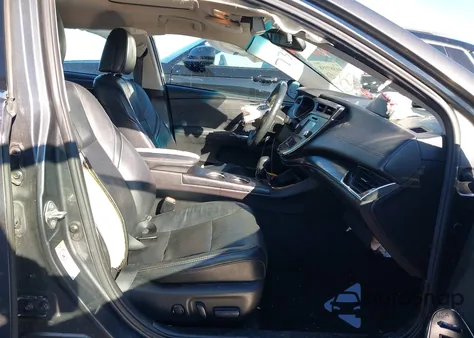 2016 Toyota Avalon Hybrid Limited z USA, uszkodzony, nr VIN 4T1BD1EB2GU055657